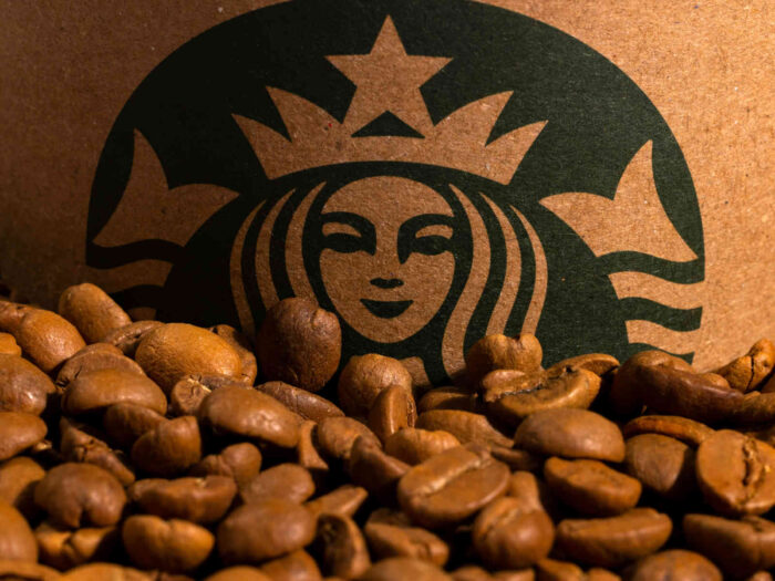 Starbucks mission statement, vision statement, coffeehouse business purpose, goals analysis case study, cup on coffee beans Starbucks mission statement, vision statement, coffeehouse business purpose, goals analysis case study, cup on coffee beans