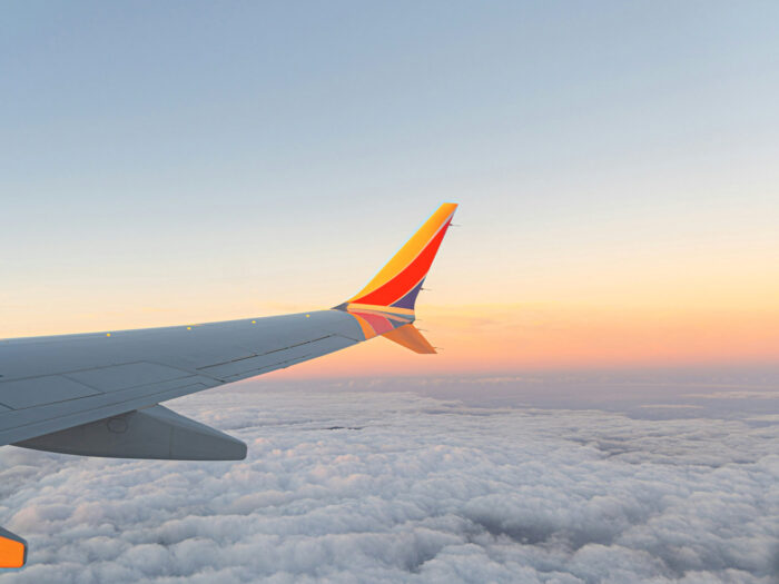 Southwest Airlines stakeholders, ESG, CSR, sustainability, corporate citizenship, business ethics case, aircraft in flight in Hawaii