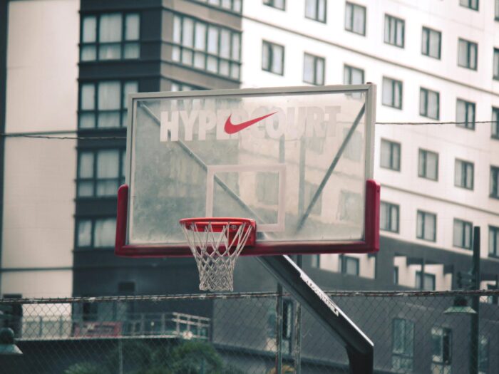Nike CSR ESG stakeholders, corporate citizenship, sustainable business ethics, sportswear business analysis case study, basketball goal