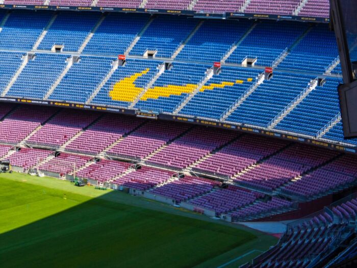Nike promotional mix, marketing communications mix, athletic shoes, clothes, equipment, business promotions case study, Barcelona stadium