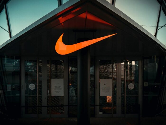 Nike operations management, 10 strategic decisions, sporting goods company productivity metrics, inventory, supply chain analysis, Wolfsburg