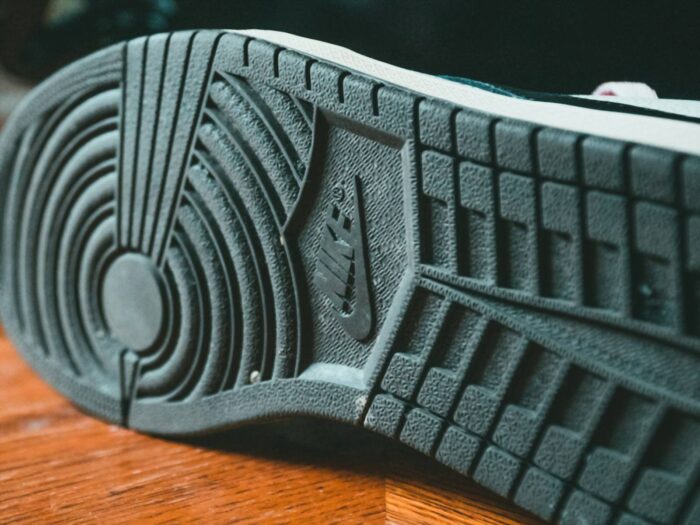 Nike marketing communications mix, promotional mix, sporting goods business promotion strategy and tactics analysis, shoe sole