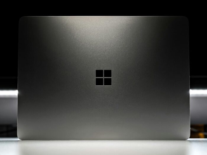 Microsoft marketing mix, 4P, 4Ps, product, price, place, promotion, computer technology business strategy analysis, Surface laptop