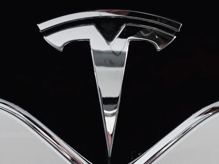 Tesla Five Forces Analysis, Recommendations, competitive rivalry, buyers, suppliers, substitutes, new entrants, energy and automotive, emblem