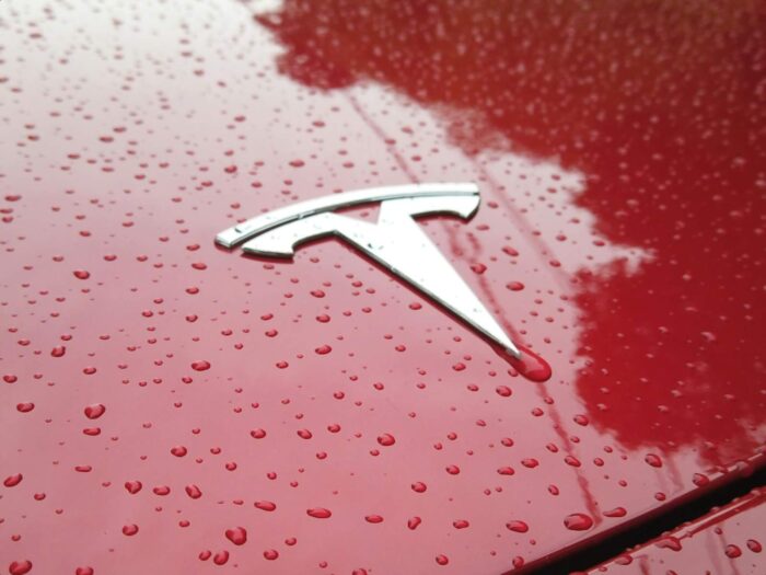 Tesla PESTEL analysis and recommendations, political, economic, social, technological, environmental, legal factors, automotive energy business, emblem